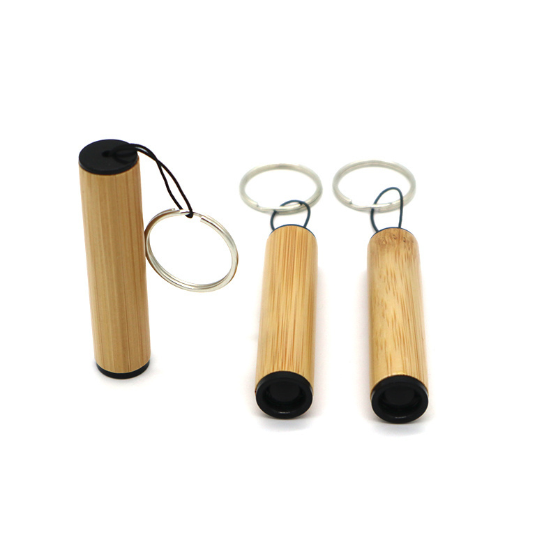 White LED bamboo mini keychain flashlight with button cell battery