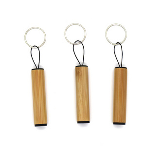 White LED bamboo mini keychain flashlight with button cell battery