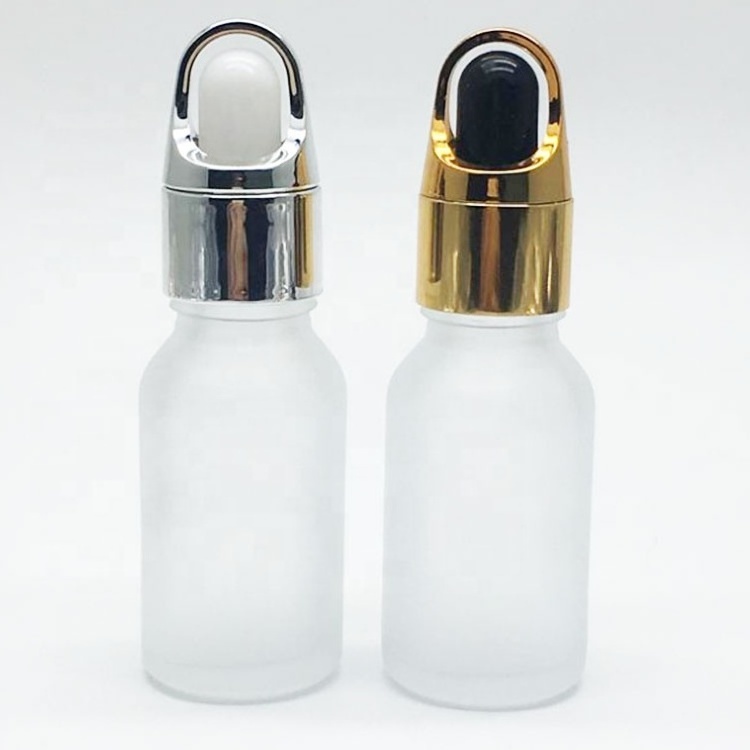 OEM Custom Boston Round Glass Dropper Bottles 15ml 30ml Clear Essential Oil Bottles  For Hair Oil Body Oil