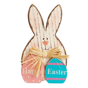 Adorable Easter Bunny Sitting behind 2 Easter Eggs wishing everyone a Happy Easter. Perfect on any end table or shelf to display