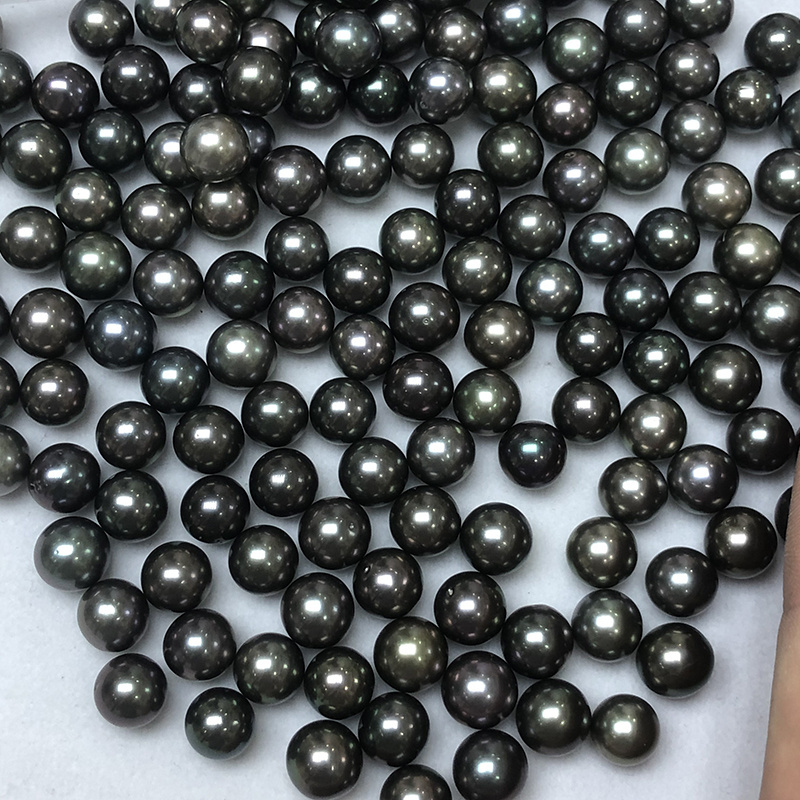 wholesale natural tahitian pearls,11-12mm,round,good luster,slight blemish