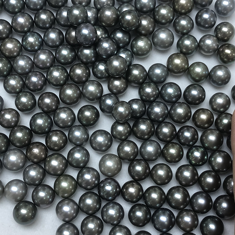 wholesale natural tahitian pearls,11-12mm,round,good luster,slight blemish