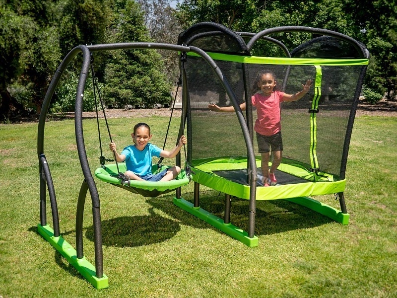 Kids jumping 4' trampoline and Saucer Swing Set  toys in Green/Black