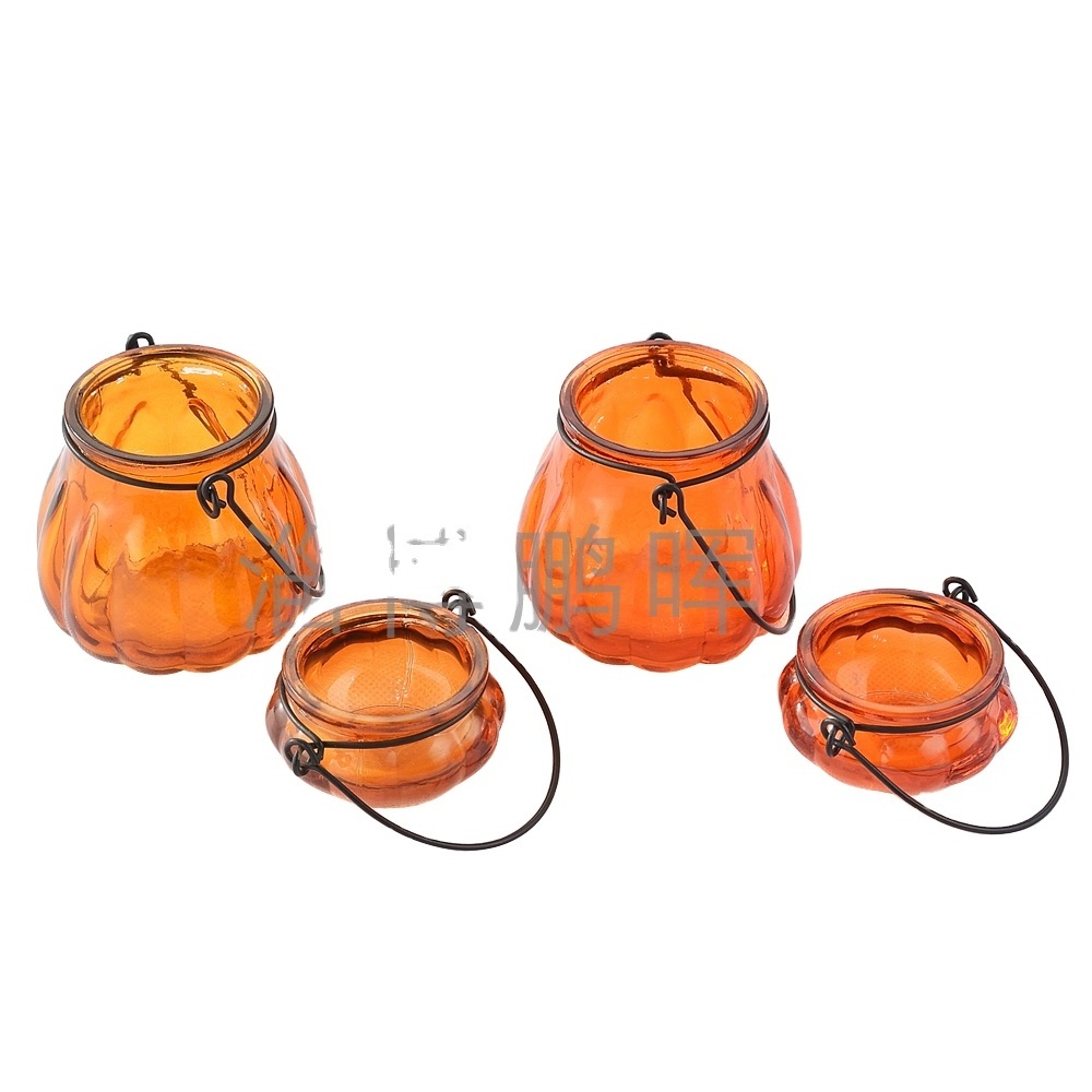 Wholesales cheap price pumpkin shape  spraying color empty glass candle jar with metal handle for halloween