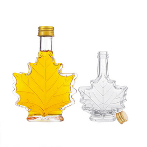 Christmas Wedding Gift 50ml 100ml 8oz Maple Shape Crystal Liquor Glass Bottle With Screw Metal Cap For Pure Syrup Wine Whisky