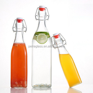 Hot Sale 250ml 16oz 750ml Clear Empty Drinking Enzyme Beverage Beer Juice Water Milk Glass Bottles with Swing Top