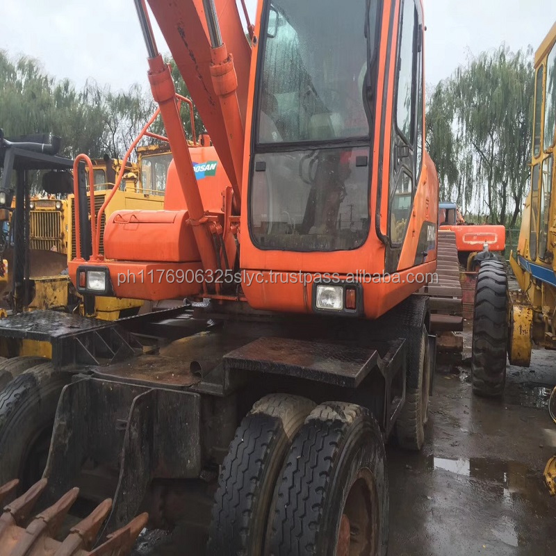 Used doosan excavator DH140W-7 wheel excavator with good excavator bucket and tire for sale