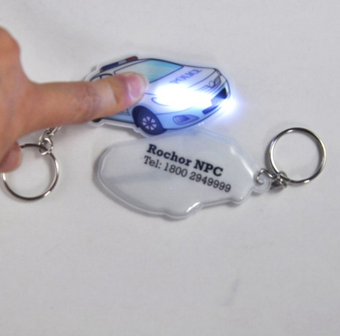 Promotional useful pvc led keychain light keychain/flashlight keychain with Logo