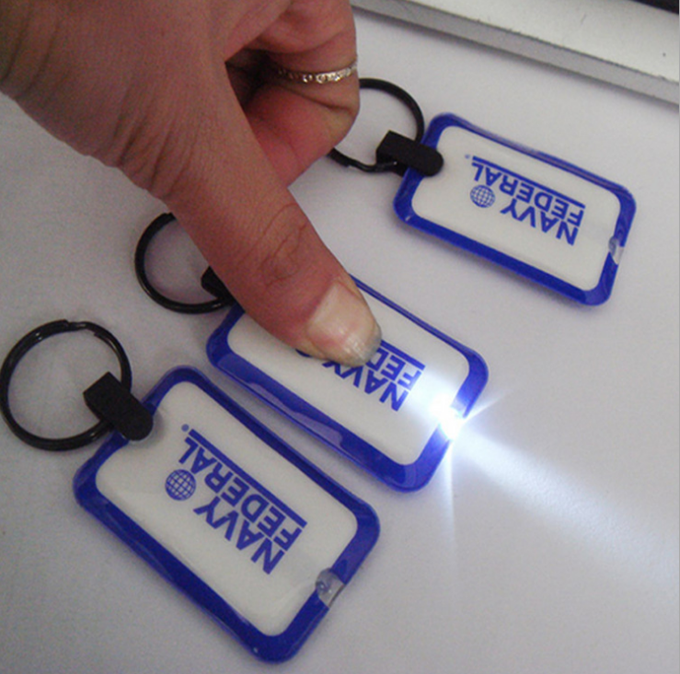 Promotional useful pvc led keychain light keychain/flashlight keychain with Logo