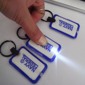 Promotional useful pvc led keychain light keychain/flashlight keychain with Logo