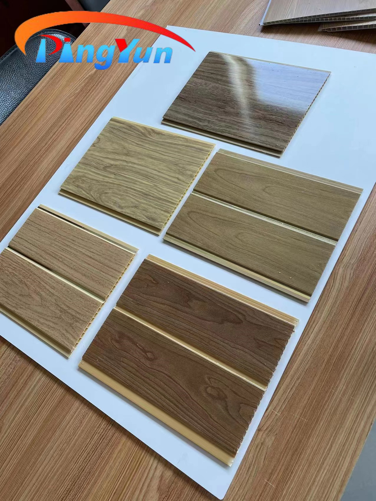 PVC Ceiling Panel Modern Customizable Waterproof Board Strip Low Price Wood PVC Resin & Calcium Powder 2 Years Ceil Waterproof