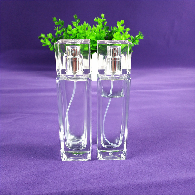 Transparent 50ml perfume bottles wholesale rectangular attar crystal bottle pump spray attar glass oil bottle