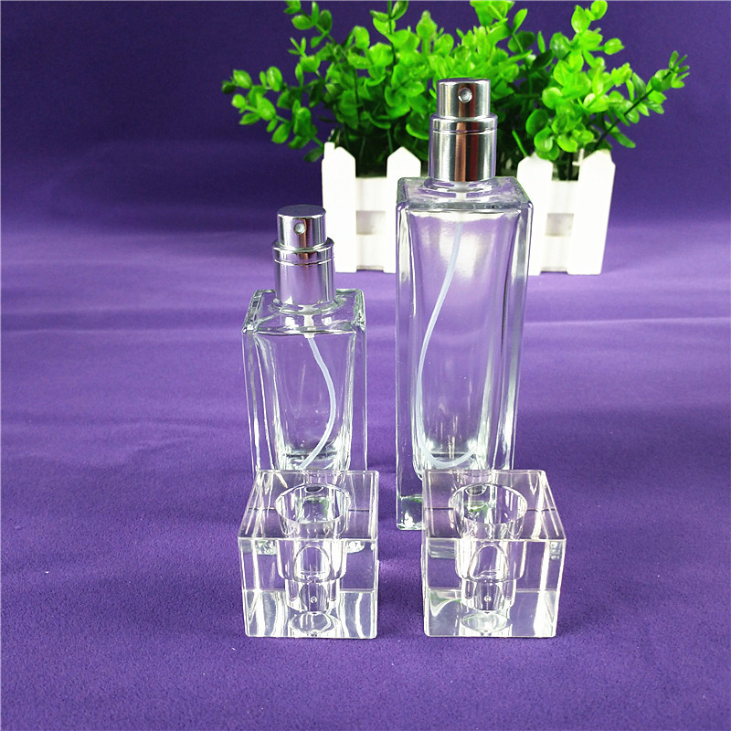 Transparent 50ml perfume bottles wholesale rectangular attar crystal bottle pump spray attar glass oil bottle