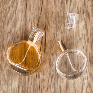 OEM Custom Logo Empty Luxury Refillable Flat Botol Parfum Mist Spray 50Ml 30Ml Transparent Glass Round Perfume Bottle