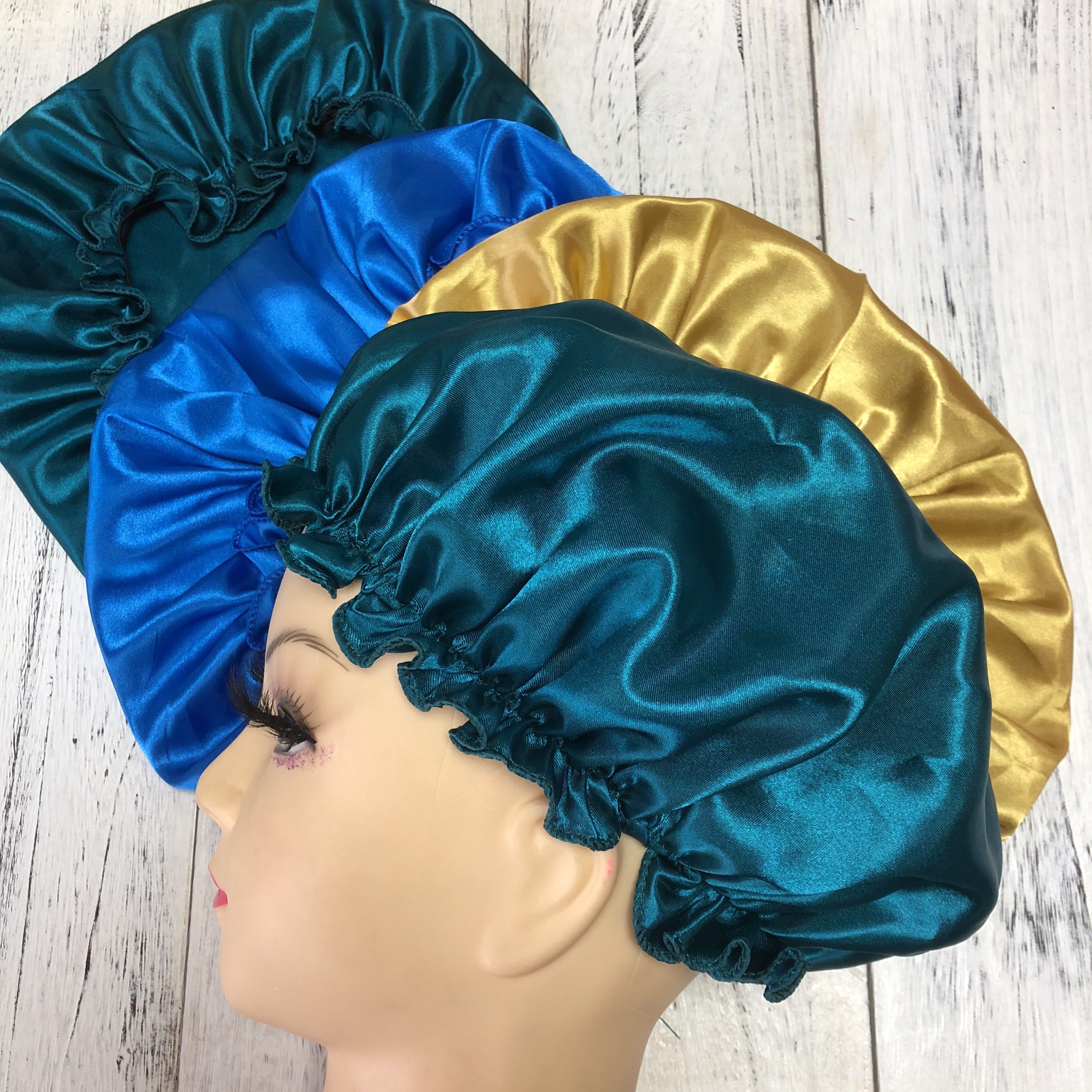 adjustable bonnet with designers  logo for hair