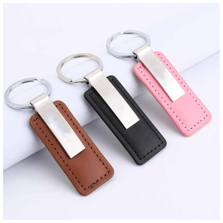 China factory wholesaler custom luxury PVC acrylic plate metal sneaker designer casting laser 3D logo leather keychain