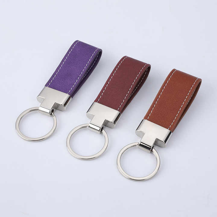 China factory wholesaler custom luxury PVC acrylic plate metal sneaker designer casting laser 3D logo leather keychain