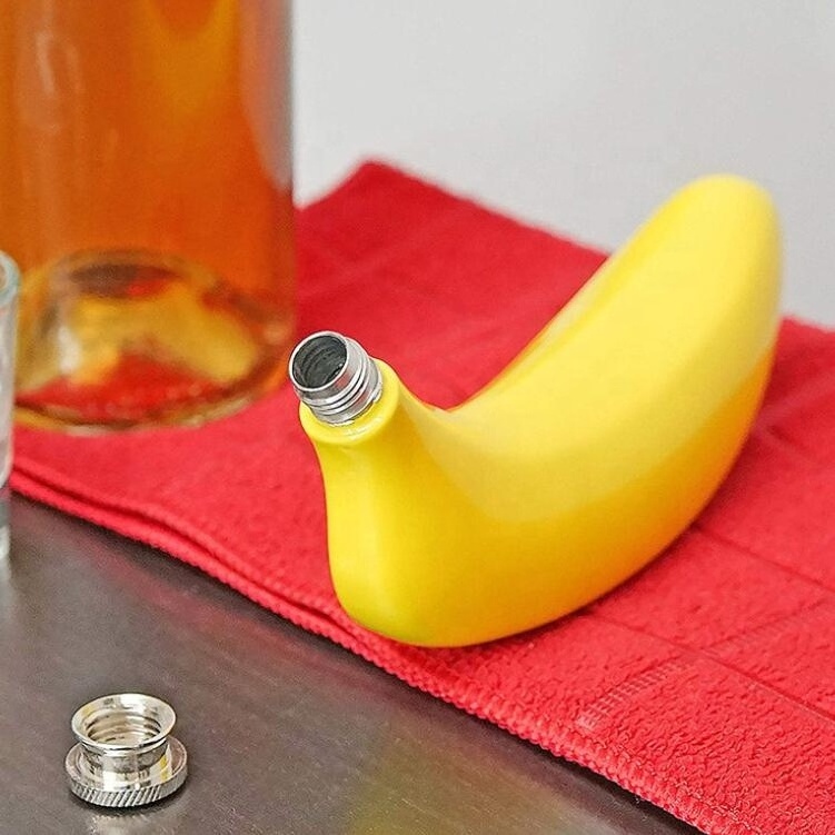 customized laser logo mini metal banana shape hip flask