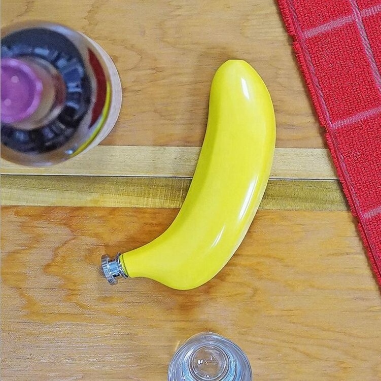 customized laser logo mini metal banana shape hip flask