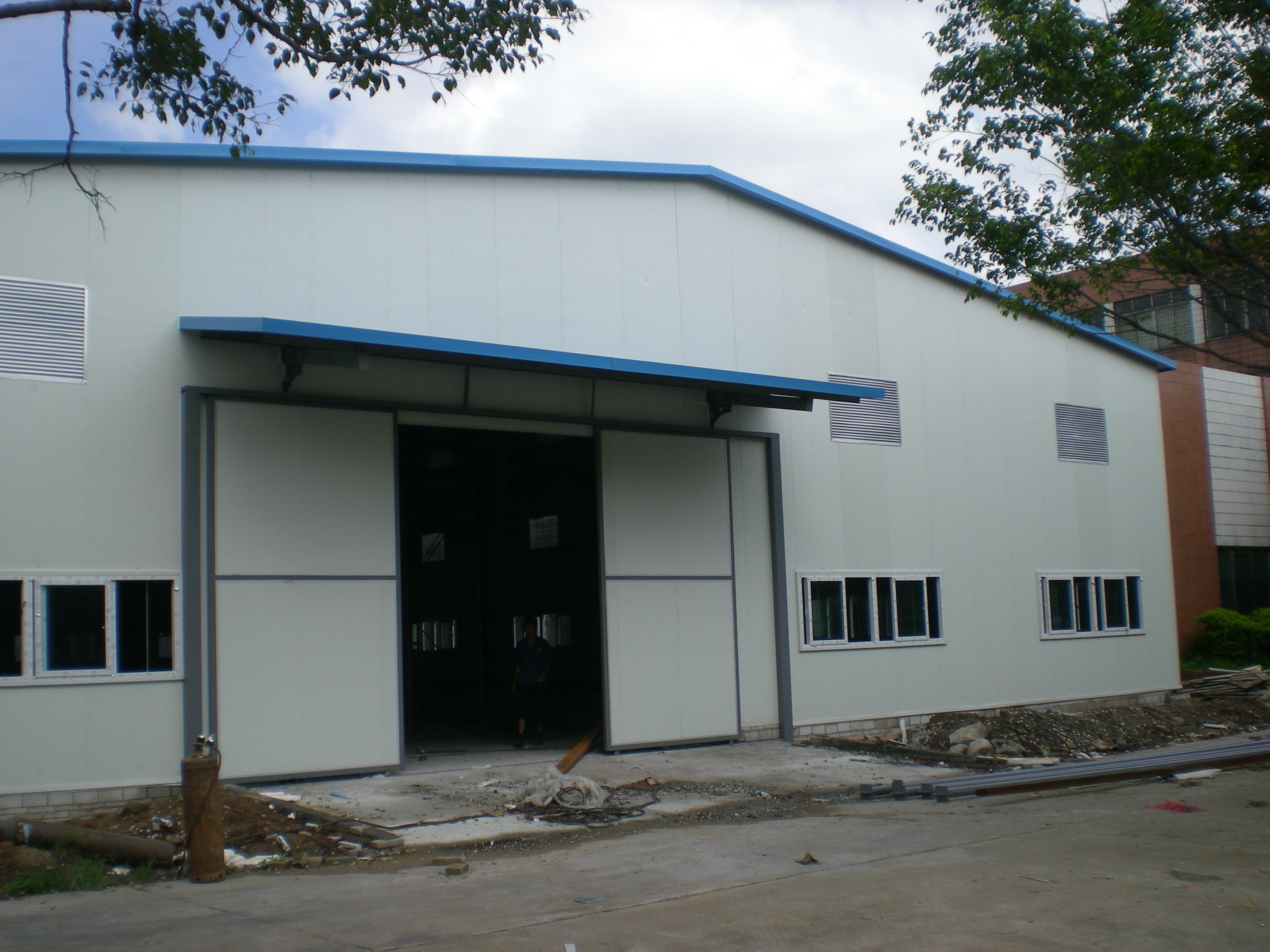 Easy assemble storage steel structure frame warehouse shed light weight Pre Fab warehouse structural with H beam