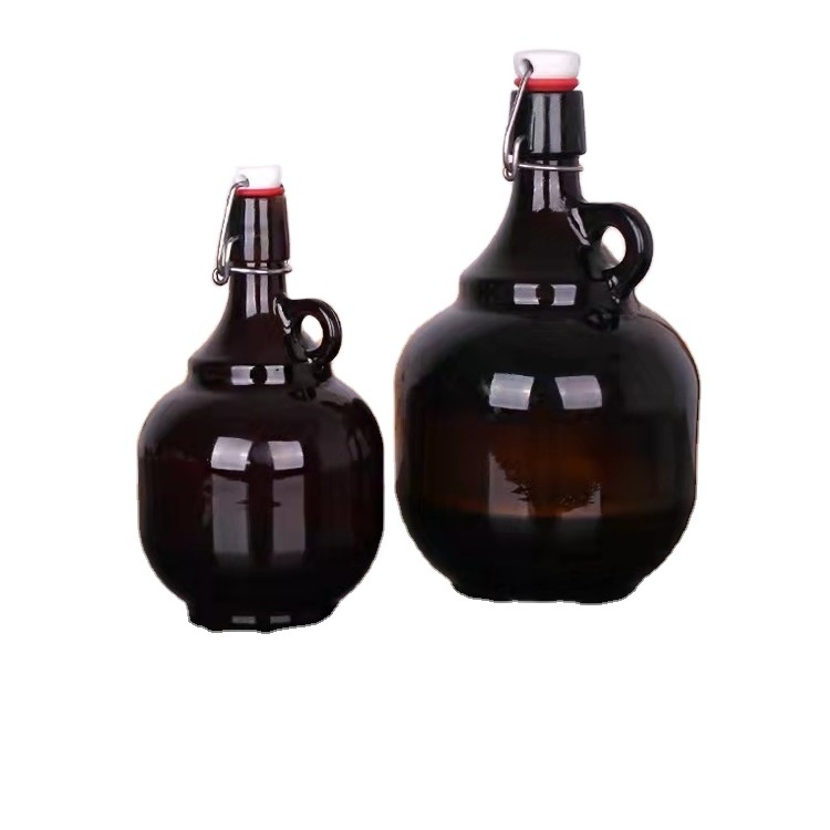 Wholesale empty glass beverage bottles 32oz 64oz swing top bottles with airtight rubber seal flip caps