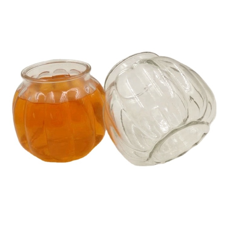 New Design Cheap Price  Pumpkin Shaped Glass Packing Jar Recycled Glass Candle Jars With Wooden Cork Wholesale