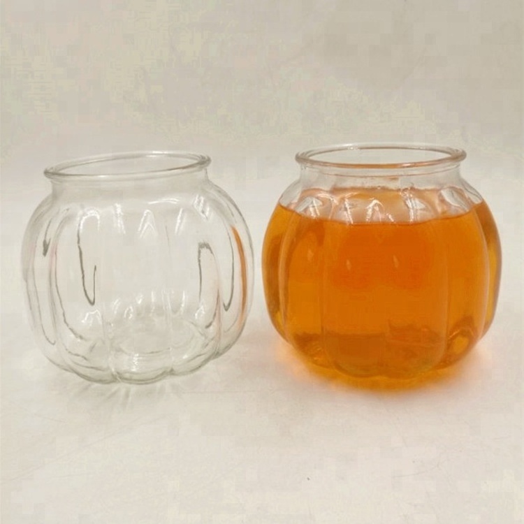 New Design Cheap Price  Pumpkin Shaped Glass Packing Jar Recycled Glass Candle Jars With Wooden Cork Wholesale