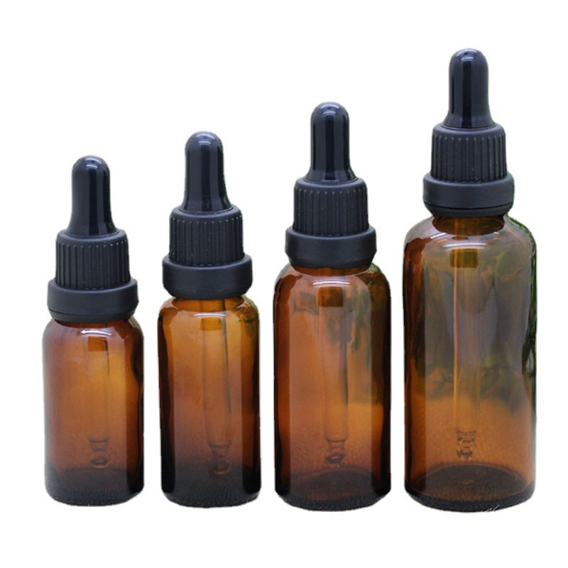 luxury refillable 5ml 10ml 15ml 30ml 50ml 100ml dark green glass dropper bottles for essential oil wholesale