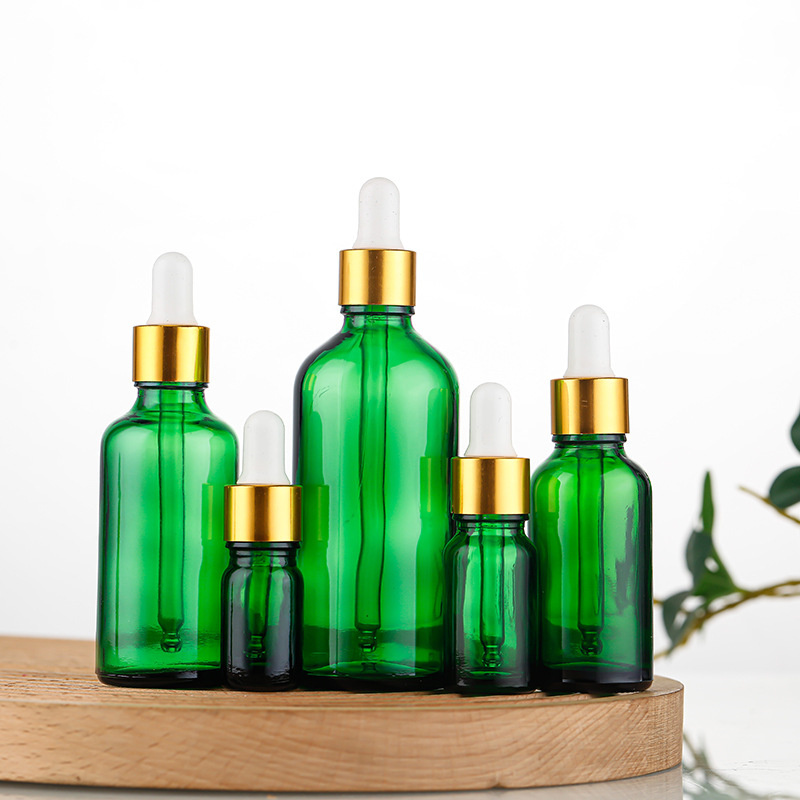 luxury refillable 5ml 10ml 15ml 30ml 50ml 100ml dark green glass dropper bottles for essential oil wholesale