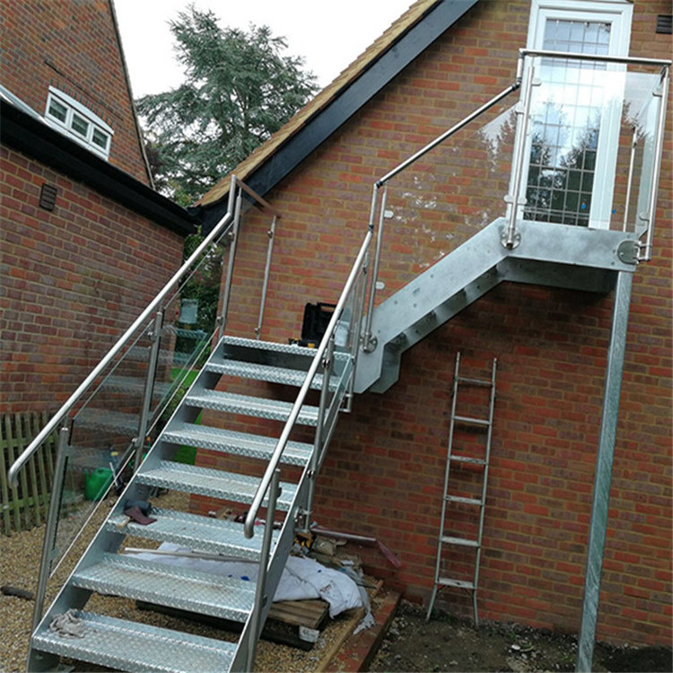 Outdoor metal fire escape with stair railings for sale