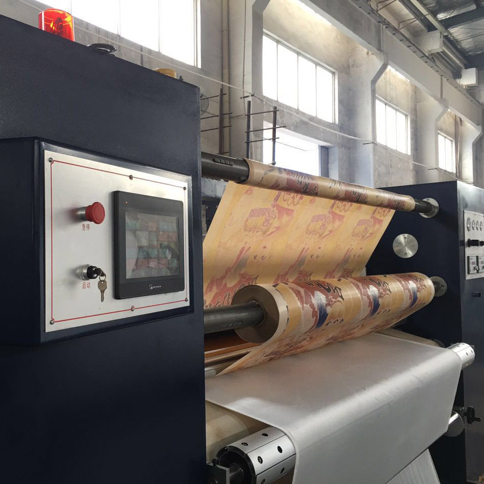 Sublimation rotary heat transfer press with vacuumed heating roller