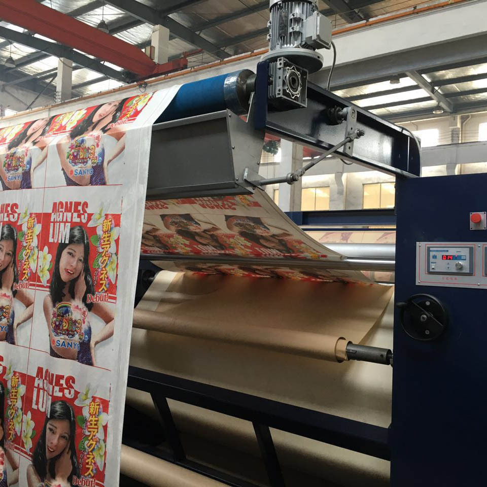 Sublimation rotary heat transfer press with vacuumed heating roller