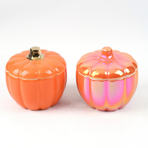 Wholesale custom logo Halloween decor pumpkin shaped candle jar ceramic candle container with lid