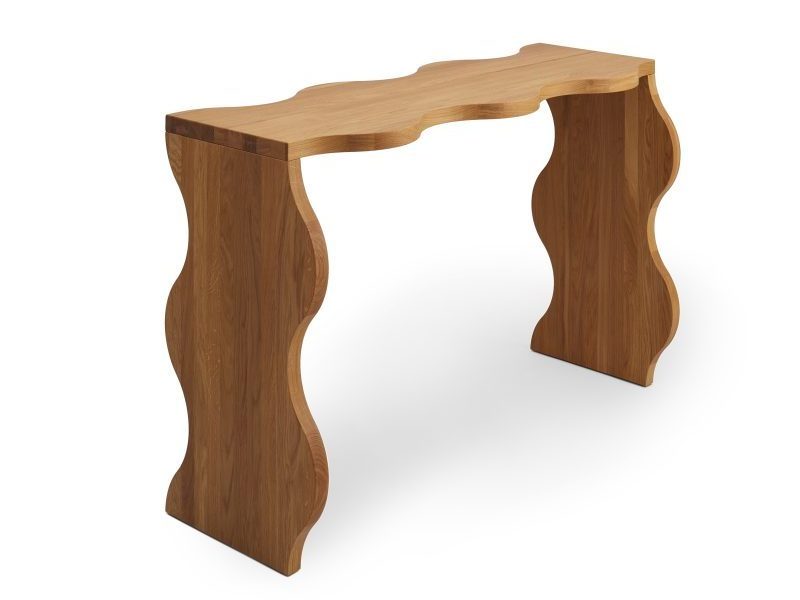 Agatha solid teak wood console table with a wavy shape with a natural finish.