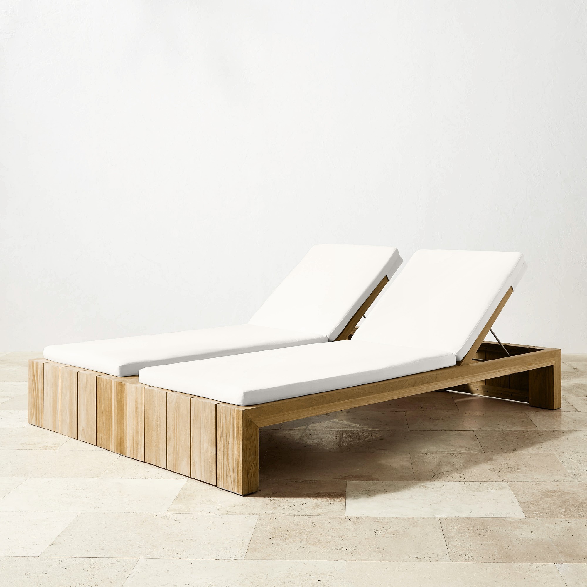 Zilak sun lounger pairs from solid jai wood and soft cushions with a natural finish.