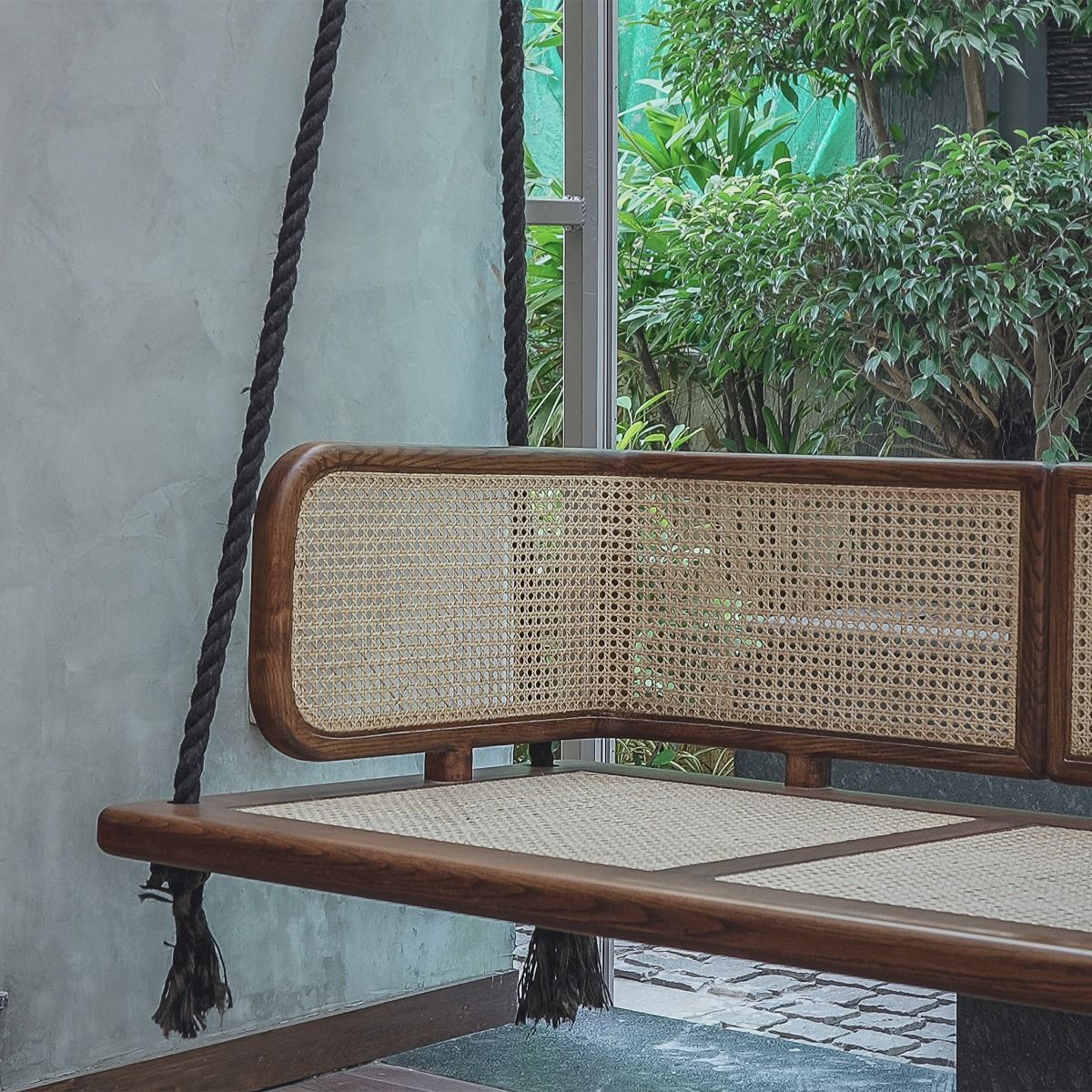 miocy swing chair made of solid teak wood frame and with rattan wicker for indoor and outdoor