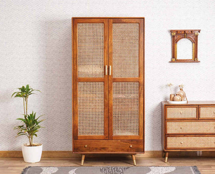 Boston solid teak wood wardrobe and woven rattan doors with bottom drawers and brown finish.