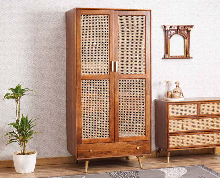 Boston solid teak wood wardrobe and woven rattan doors with bottom drawers and brown finish.