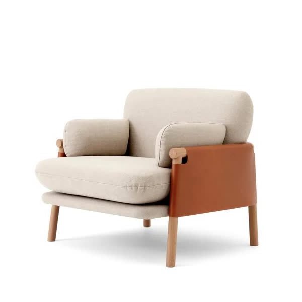 joppy lounge chair made of solid teak wood and leather frames with cushions for indoor and outdoor