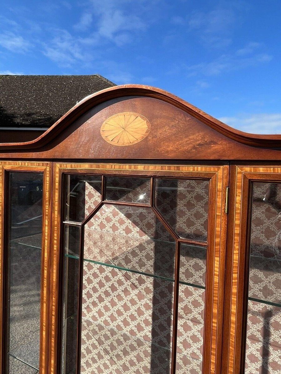 James large display cabinet in mahogany and glass with a glossy brown finish.