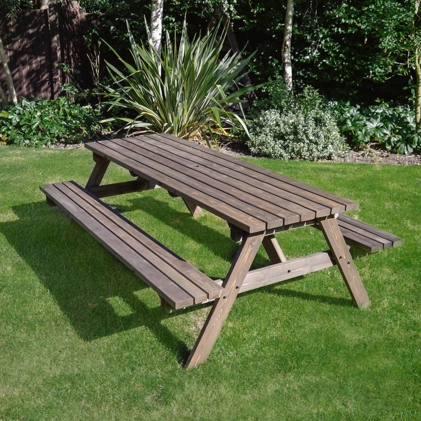 Yoona picnic bench is solid teak wood with a natural finish.