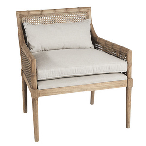 Tamara lounge chairs made of bamboo and woven rattan with natural cushions and finishes.