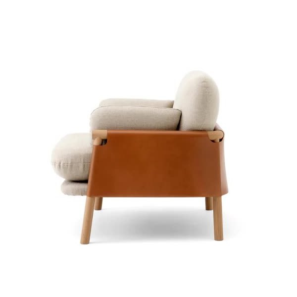 joppy lounge chair made of solid teak wood and leather frames with cushions for indoor and outdoor