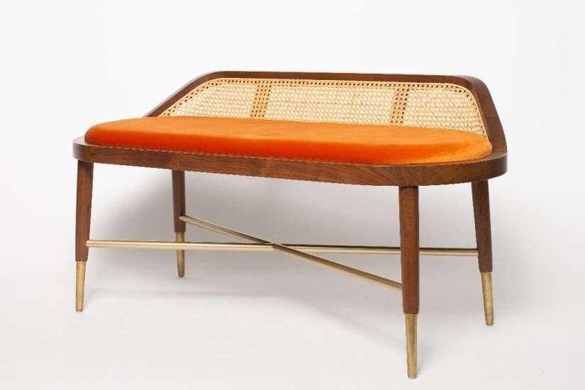 Frank modern indoor bench made of solid teak wood with a woven rattan back and soft velvet seat.