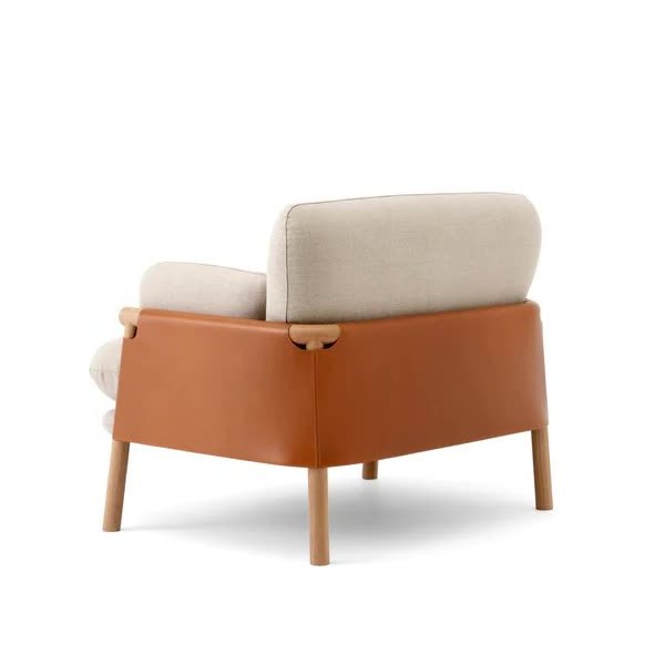 joppy lounge chair made of solid teak wood and leather frames with cushions for indoor and outdoor