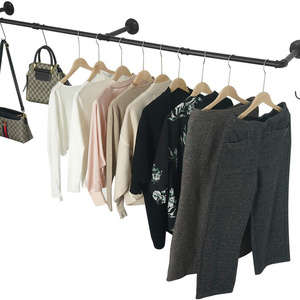 Industrial tube hanger, retail clothes, custom shop design, metal clothing apparel display rack