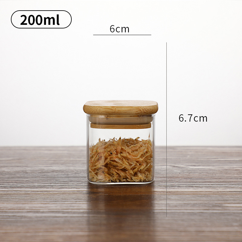 Wholesale different size Airtight round Glass Jar with a Natural Bamboo sealant Lid for Storage Coffee Nuts Cookie