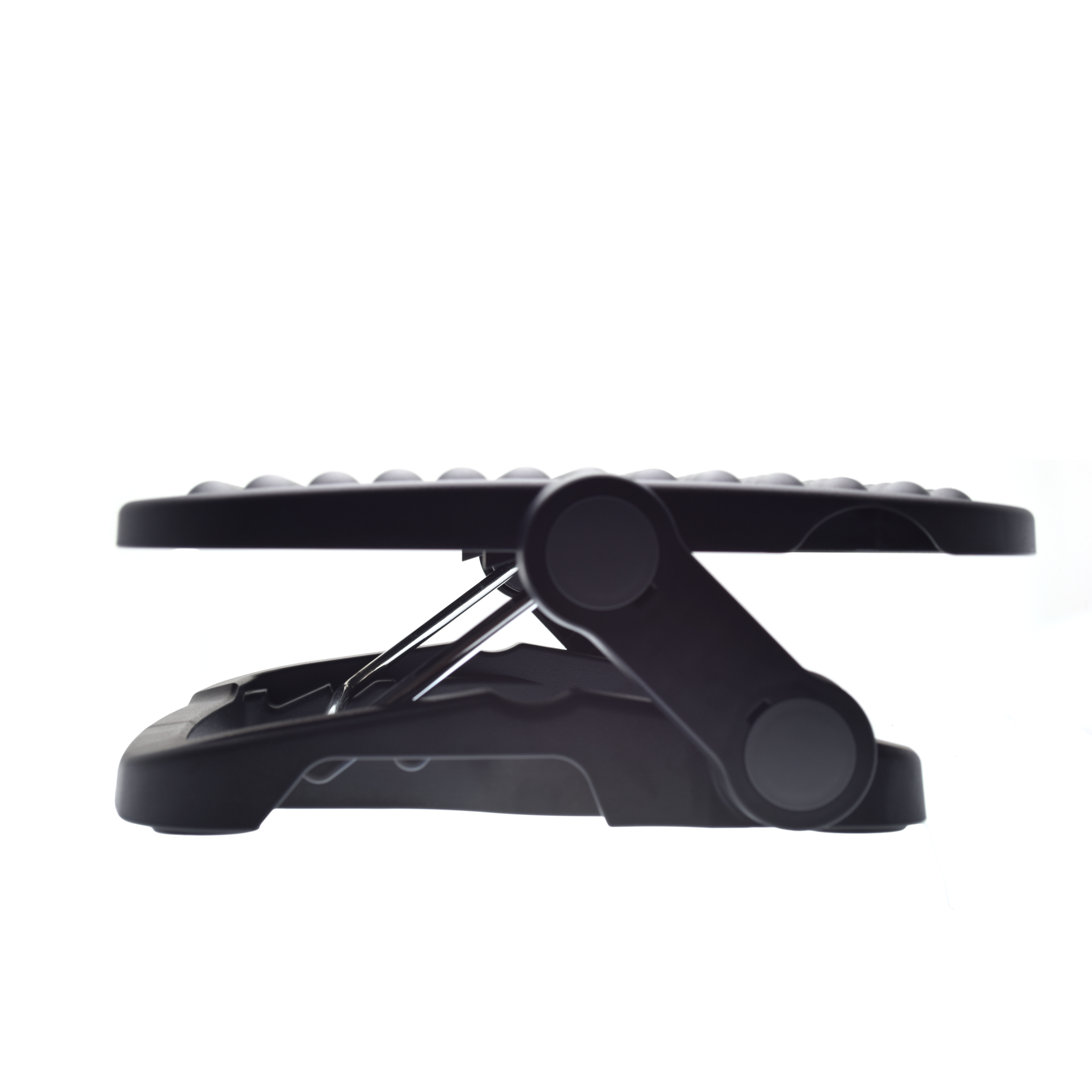 Plastic under desk foot rest for ergonomic support