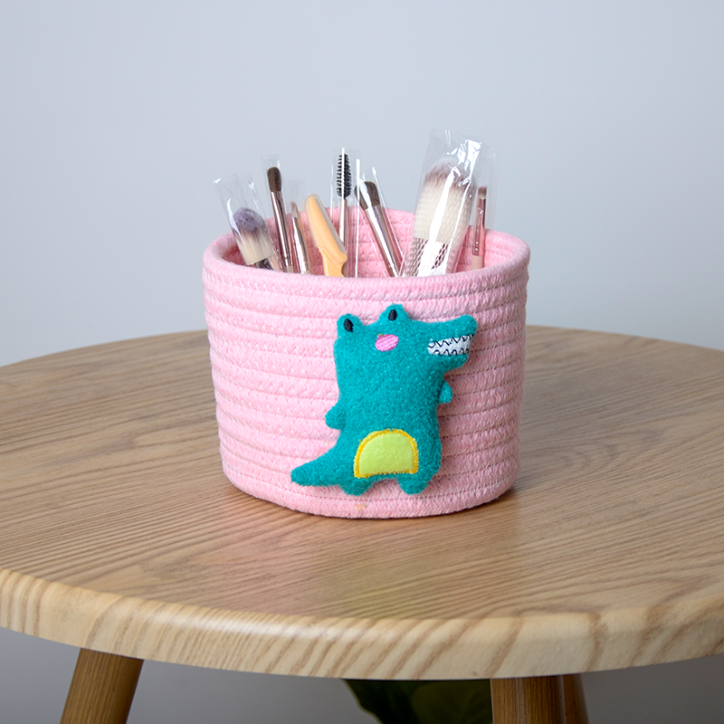 Factory direct desktop cosmetic storage basket small cotton rope sundries woven basket with cute doll storage basket