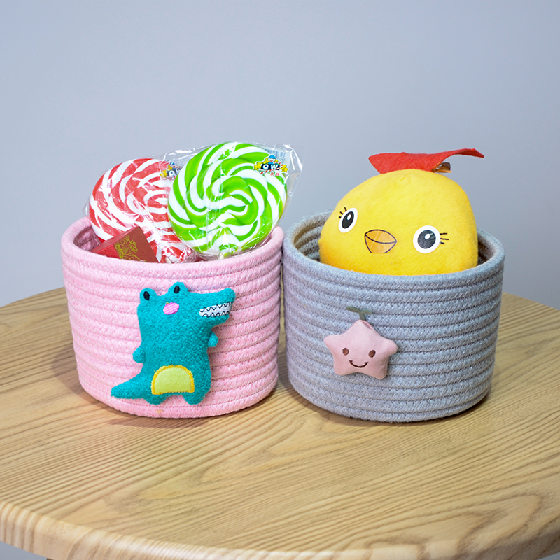 Factory direct desktop cosmetic storage basket small cotton rope sundries woven basket with cute doll storage basket